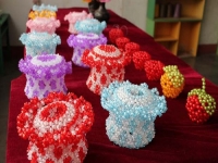 非遺勵(lì)志珠珠繡手工活給予他們樂觀、自信與美好